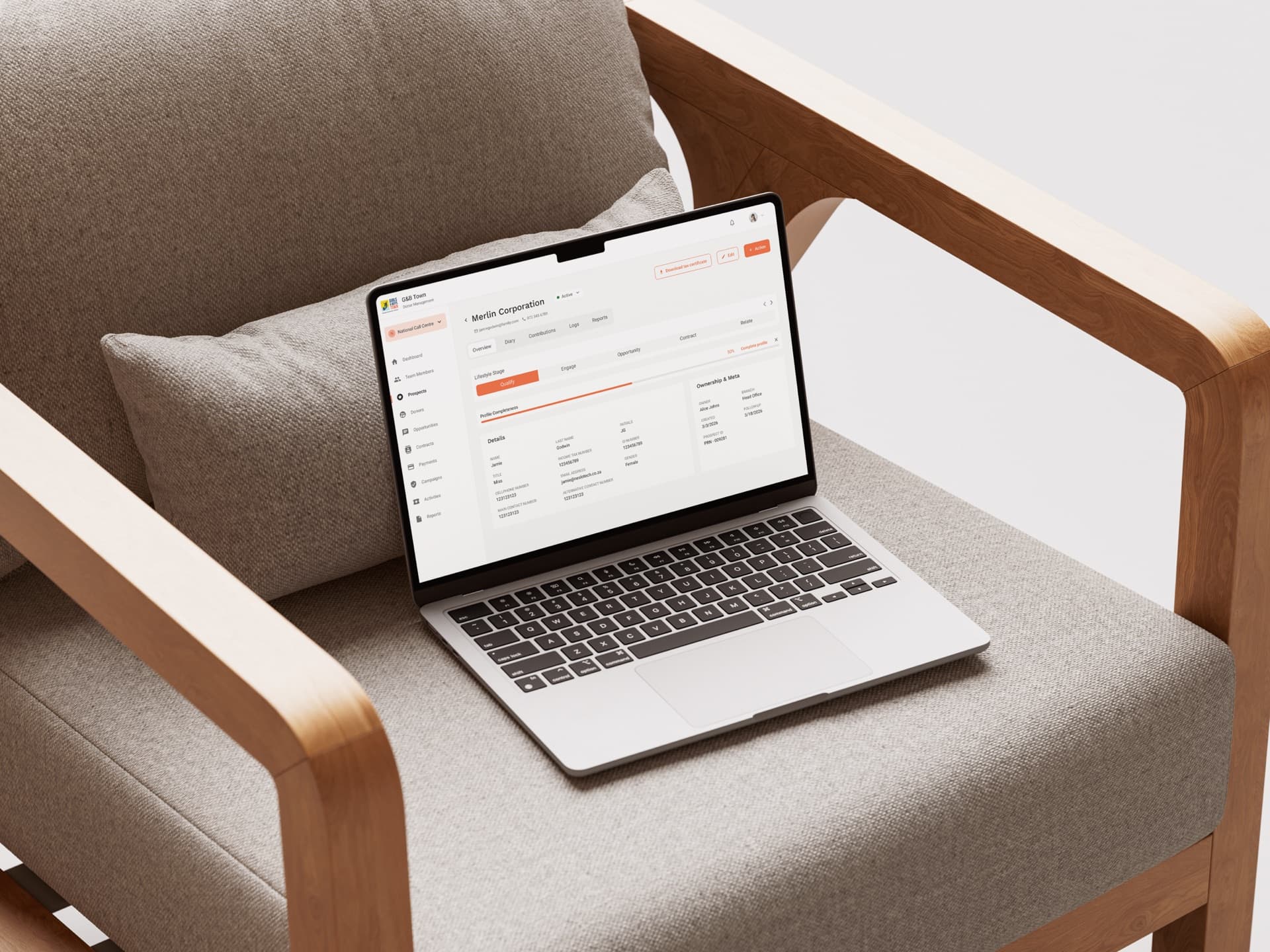 A single donor record on a laptop: overview tab with lifestyle stage, profile completeness, ownership and meta, and a download-tax-certificate action