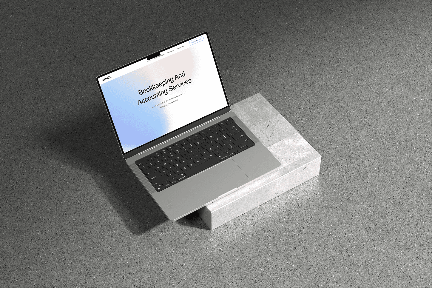 Xenith homepage shown on a laptop